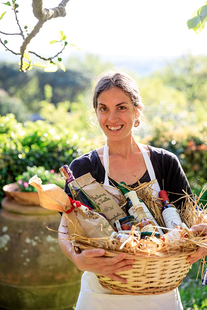 Francesca with a gift hamper