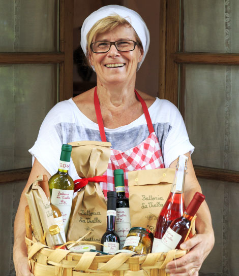 Luigina, the cook, shows us a hamper with the Fattoria’s delicious organic and biodynamic products